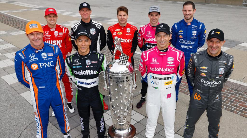 Current Indianapolis 500 winners racing in the 2023 event posed with the Borg-Warner Trophy.