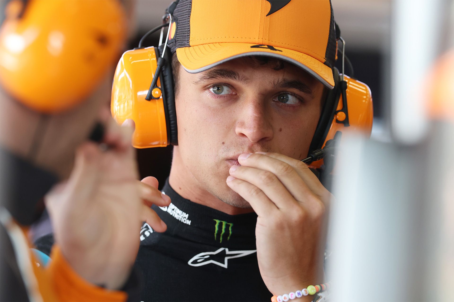 Lando with his headset on in the garage