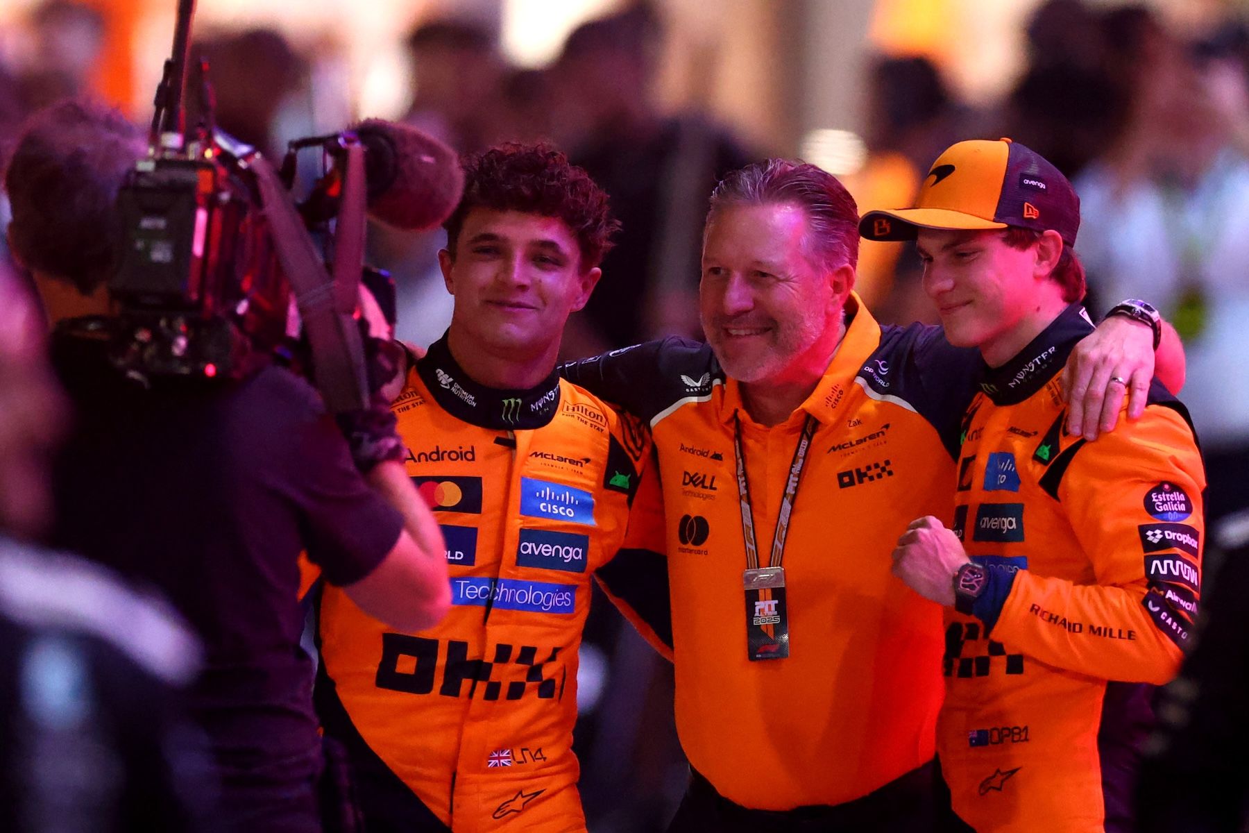 Zak Brown with Lando and Oscar