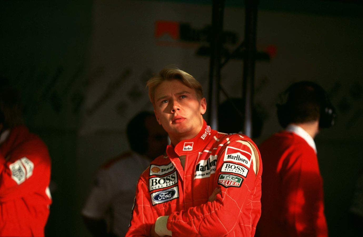 Eyes on the prize as Mika looks on in the McLaren garage