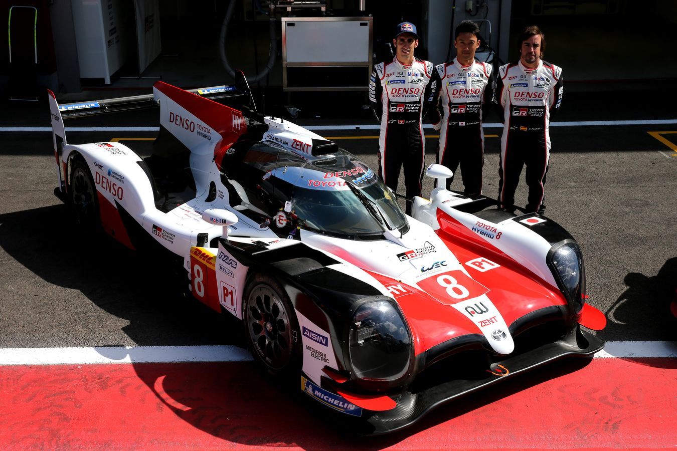 Fernando with teammates Sébastien Buemi and Kazuki Nakajima