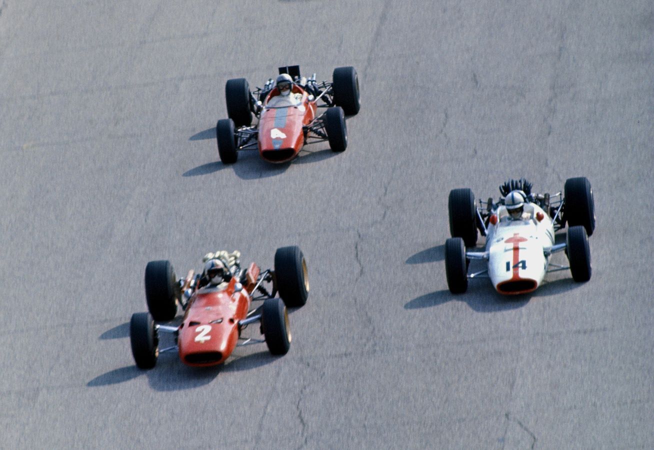 Spot the McLaren: Ferrari’s Chris Amon leads eventual race winner John Surtees and Bruce McLaren at the 1967 Italian Grand Prix